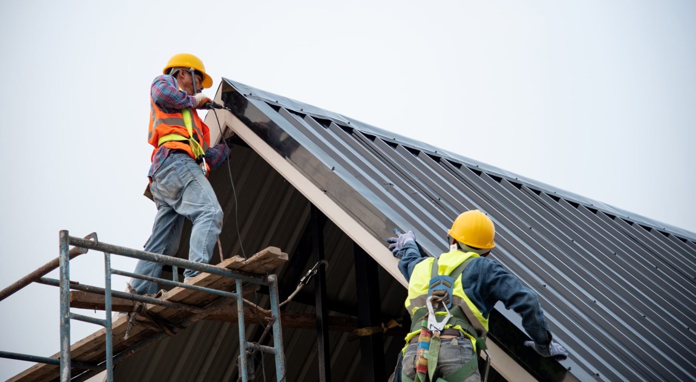 Professional roofing contractors installing metal roof in El Dorado Hills, CA